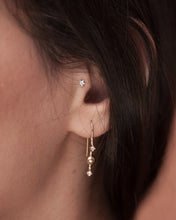Indlæs billede til gallerivisning Gold plated silver hook earring Venus Stars from Kinz Kanaan. Set with cubic zirconiuas. Festive sparkly earrings.
